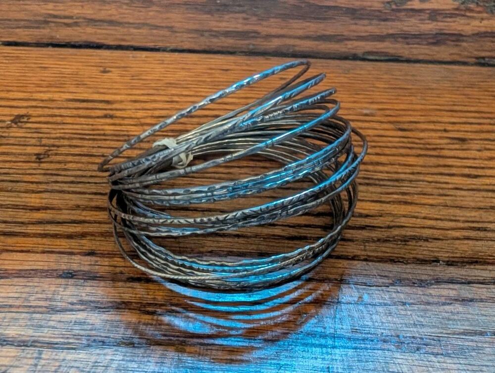 Vintage Stack Of thin Silver Bangels Bracelets Set